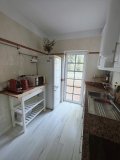 Kitchen with access to the front patio